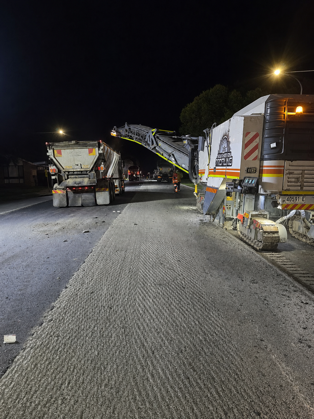 QLD Civil roadworks crew operating at night
